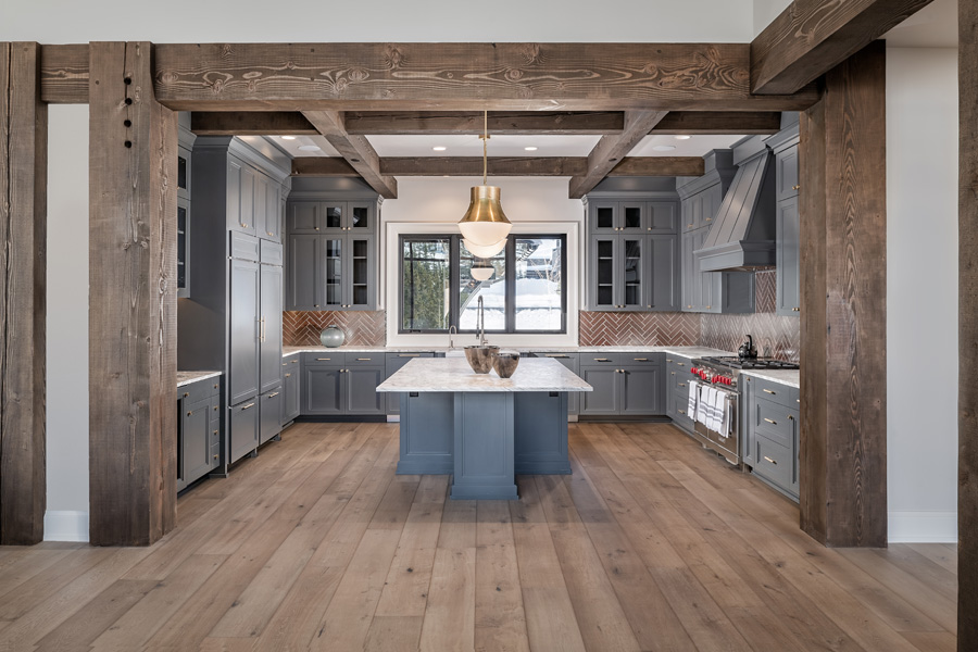 Grey cabinets and island in the kitchen space
