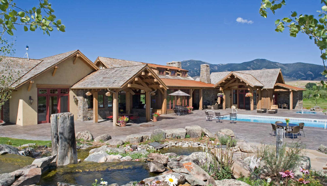 montana home builders hero image exterior backyard pool