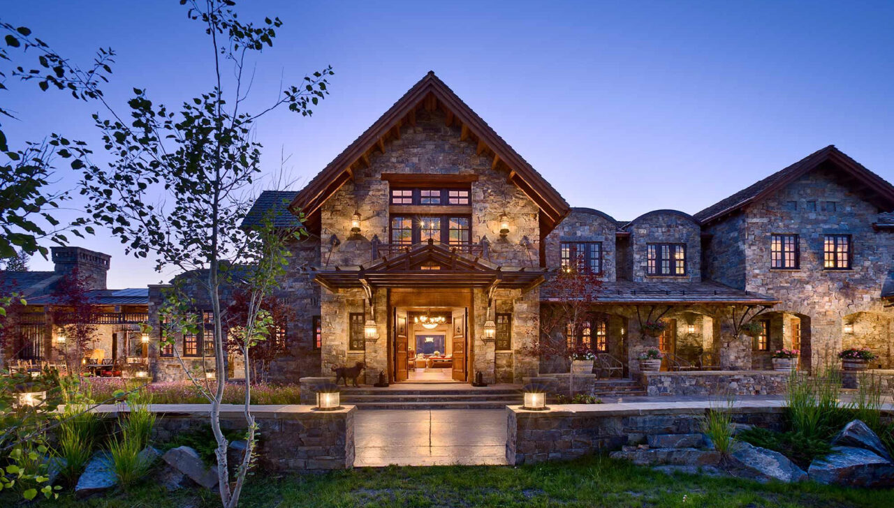 montana home builders exterior entrance night