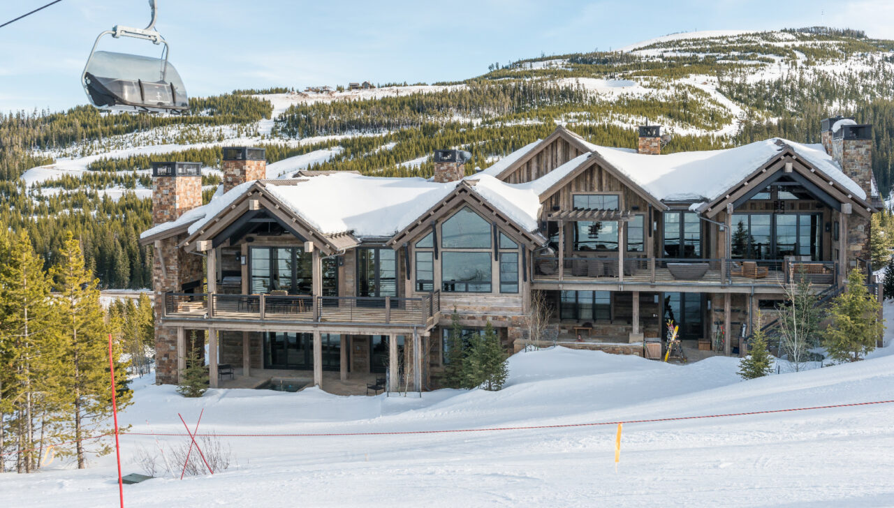 montana home builders exterior ski lift in front of mountain
