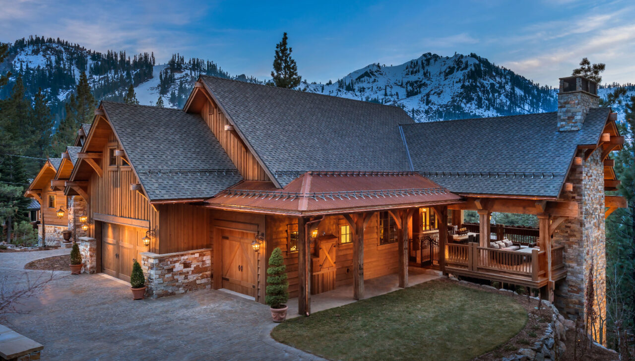 montana home builders deck in front of mountain