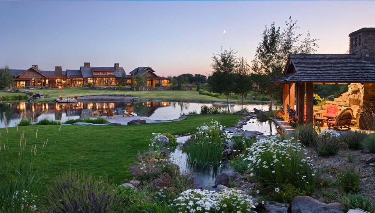 montana home builders farm pond patio and dock night