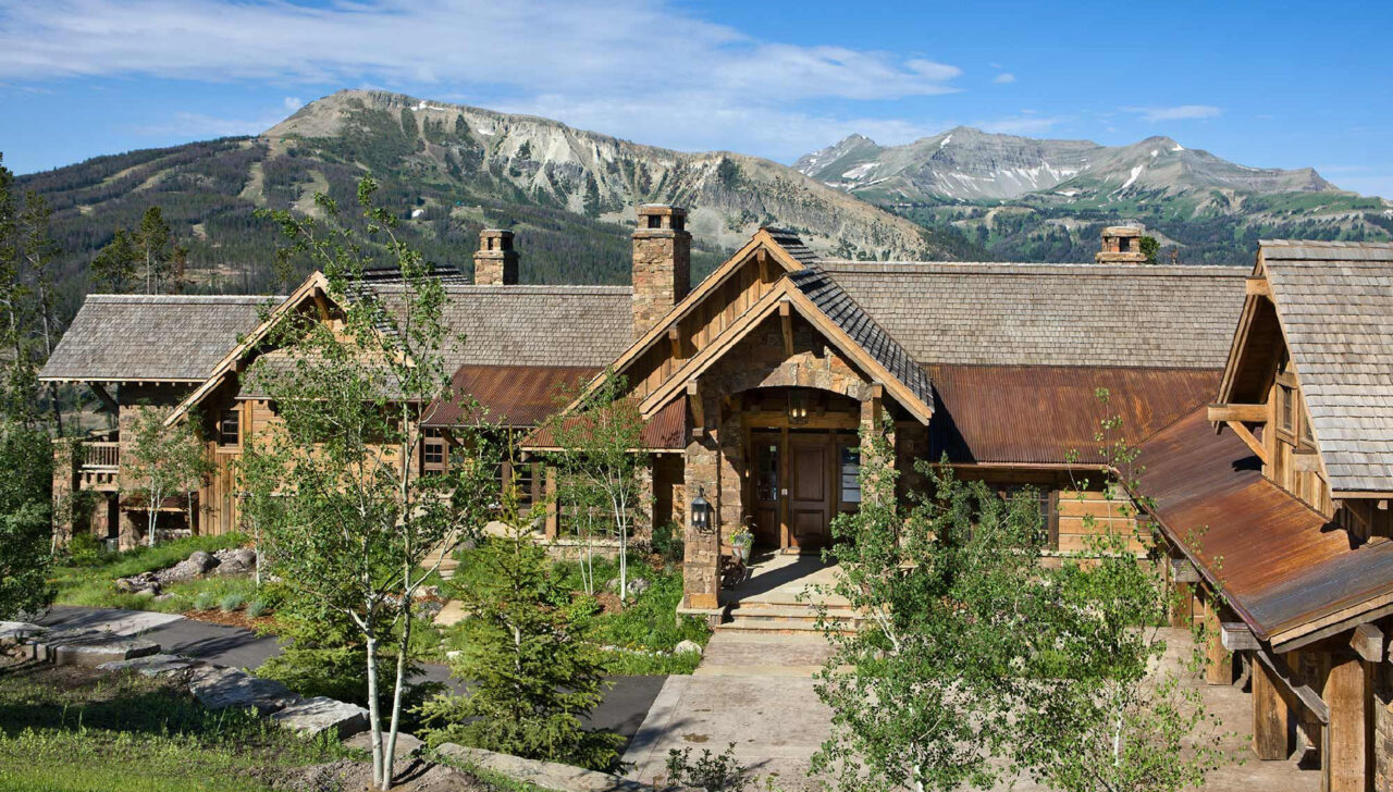 montana home builders walkway entry in front of mountain