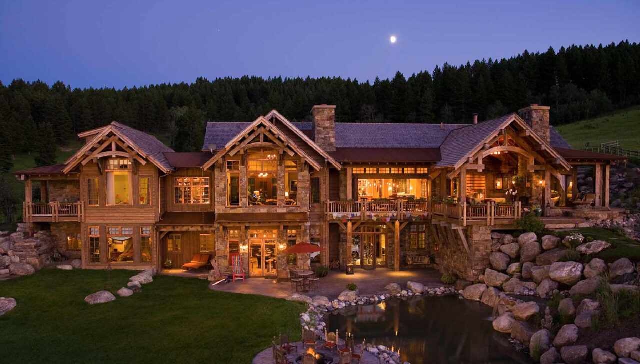 montana home builders backyard exterior forest night